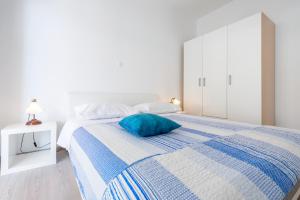 Postel nebo postele na pokoji v ubytování Apartments Miro