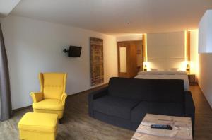 TV a/nebo společenská místnost v ubytování Hotel Stocker