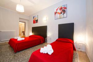 Ένα ή περισσότερα κρεβάτια σε δωμάτιο στο Domus Fabiola - Vaticano