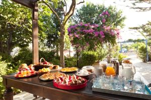 a table full of food on a table at Vagia Traditional, Aegina Island in Vaia