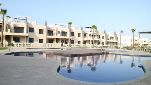 Bazén v ubytování Playa Elisa Bay nebo v jeho okolí