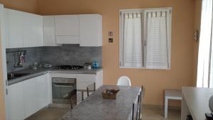 Køkken eller tekøkken på Lacona Casa Franca