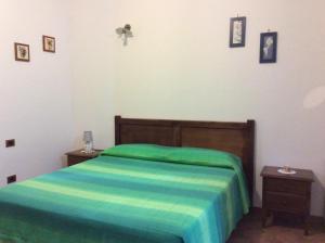 A bed or beds in a room at Agriturismo Il Morello