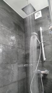 a shower in a bathroom with a shower at Catalans in Marseille +22 photos