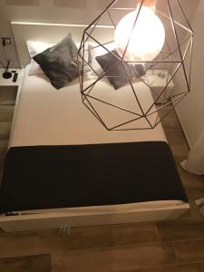 Postel nebo postele na pokoji v ubytování B&B Quasi in centro