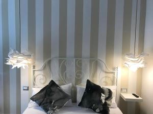 Postel nebo postele na pokoji v ubytování B&B Quasi in centro