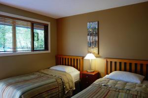 Postelja oz. postelje v sobi nastanitve Skeena River House Bed & Breakfast