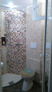 Koupelna v ubytování Zoi Residence + 37 fotografií