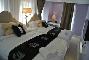 Postel nebo postele na pokoji v ubytování 1 Day Car Hotel Station 18