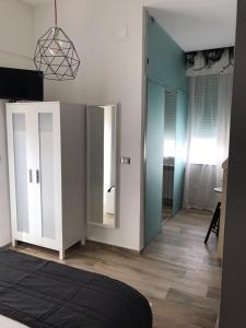 Postel nebo postele na pokoji v ubytování B&B Quasi in centro