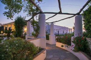 a view of a building with flowers and plants at Hotel Bellavista in Anacapri