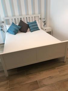 Postel nebo postele na pokoji v ubytování B&B Quasi in centro