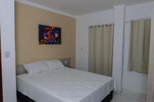 Posteľ alebo postele v izbe v ubytovaní Pojuca Plaza Hotel