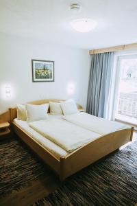 Postel nebo postele na pokoji v ubytování Haus Rainbach