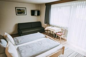 Postel nebo postele na pokoji v ubytování Haus Rainbach