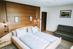 מיטה או מיטות בחדר ב-Haus Rainbach