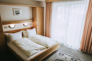 Postel nebo postele na pokoji v ubytování Haus Rainbach