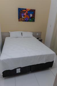 Posteľ alebo postele v izbe v ubytovaní Pojuca Plaza Hotel
