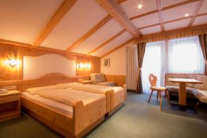 Postel nebo postele na pokoji v ubytování Pension Maria + 37 fotografií