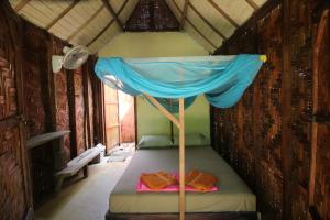 a room with a bunk bed in a tent at Sanctuary Lanta in Ko Lanta