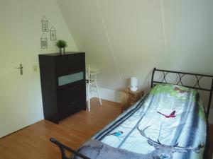 Postel nebo postele na pokoji v ubytování EnjoyDeVeluwe