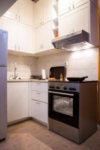 A kitchen or kitchenette at Casa Afrodite