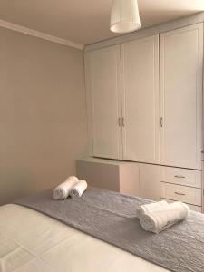 A bed or beds in a room at Casa Afrodite