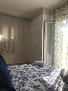 A bed or beds in a room at Casa Afrodite