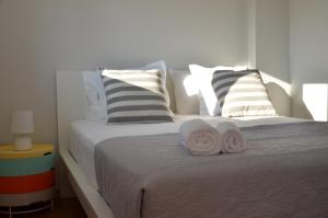 A bed or beds in a room at Casa Afrodite