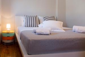 A bed or beds in a room at Casa Afrodite
