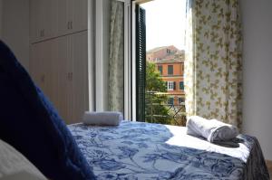 A bed or beds in a room at Casa Afrodite