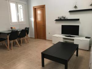 A television and/or entertainment centre at Casa Afrodite