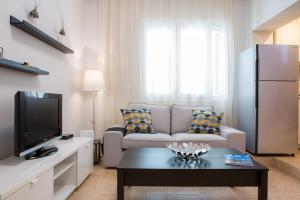 A television and/or entertainment centre at Casa Afrodite