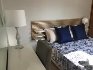 A bed or beds in a room at Casa Afrodite