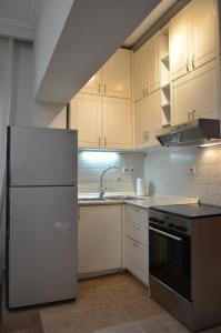 A kitchen or kitchenette at Casa Afrodite