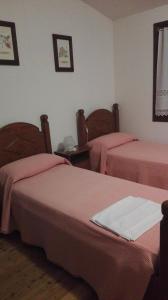 Postel nebo postele na pokoji v ubytování Agriturismo Il Salice Ridente