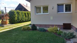 A garden outside Apartmány u Galandu
