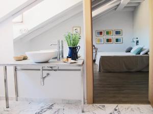 Voodi või voodid majutusasutuse Hotel Ayllon toas