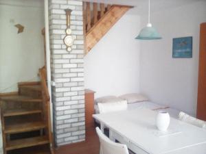 Postel nebo postele na pokoji v ubytování apartmani srecko