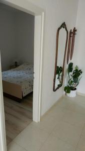 Postel nebo postele na pokoji v ubytování Apartmani Kaštelan