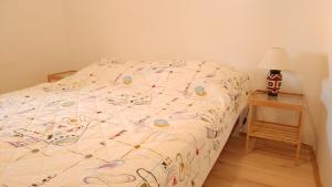 Postel nebo postele na pokoji v ubytování Apartmani Kaštelan