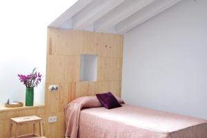 Voodi või voodid majutusasutuse Hotel Ayllon toas