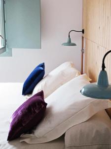 Voodi või voodid majutusasutuse Hotel Ayllon toas