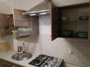 Virtuvė arba virtuvėlė apgyvendinimo įstaigoje Apartament Morska Fala