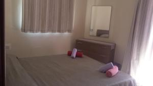 En eller flere senger på et rom på Apartment Triq is-Silla
