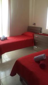 En eller flere senger på et rom på Apartment Triq is-Silla