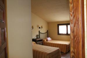 Cama o camas de una habitación en Casa Rural Celtia