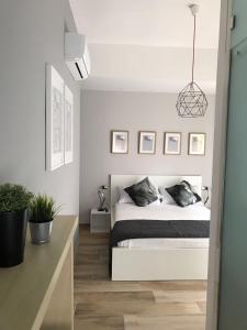 Postel nebo postele na pokoji v ubytování B&B Quasi in centro