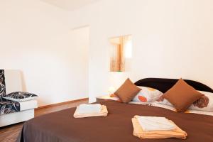 Posteľ alebo postele v izbe v ubytovaní Apartment & Room TOMA