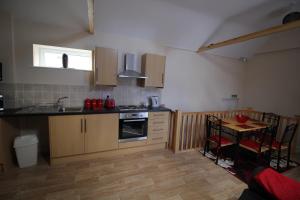 Cucina o angolo cottura di Saracens Head Old Function Room